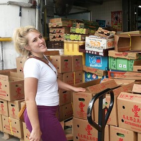 Ellie checking out fresh produce