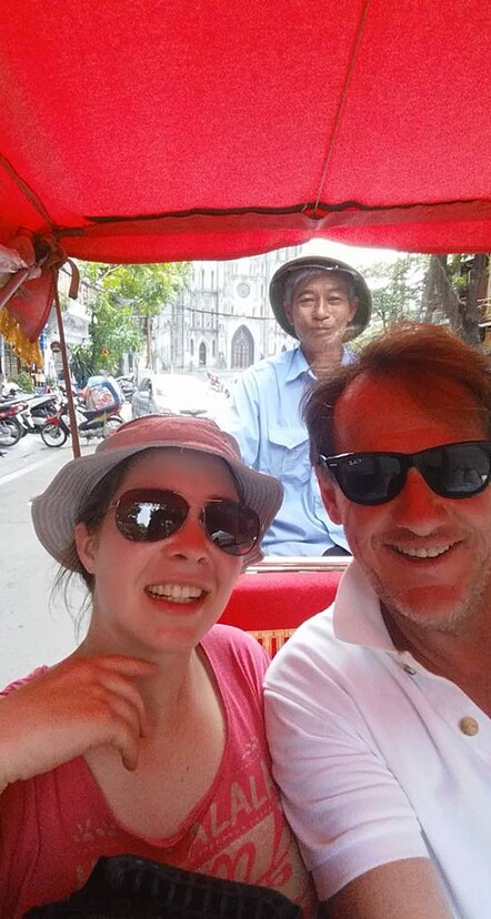 Cycle tour of Hanoi with Catherdal backdrop